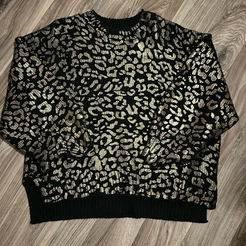 Black and gold sweater
